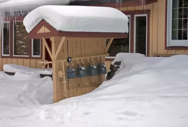 gas meters covered in snow